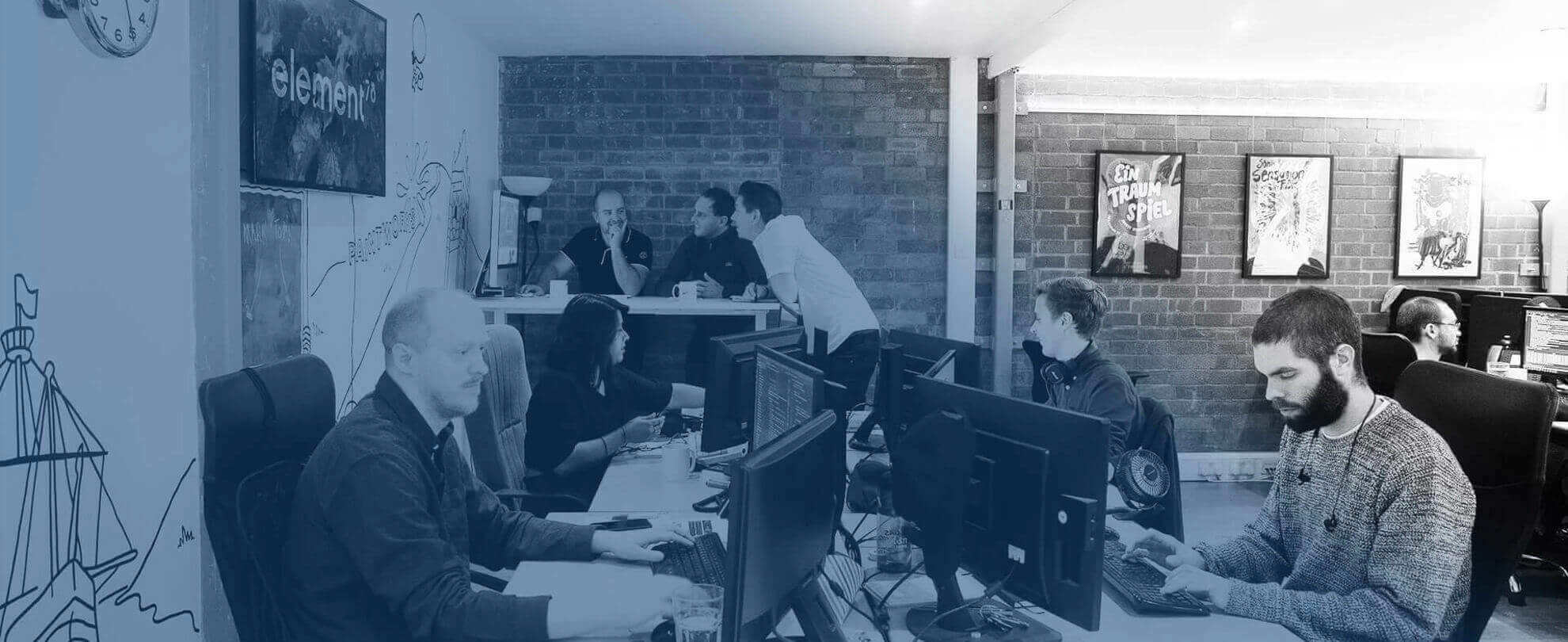 Developers and designers working in a digital agency