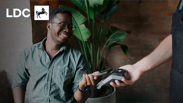 Man paying his bill by card